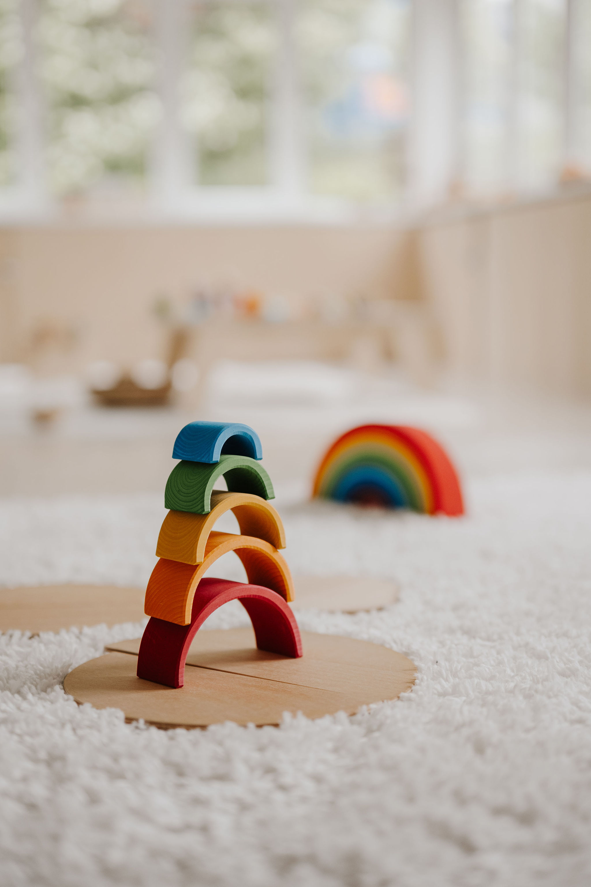 Wooden rainbow stacked on top of each other